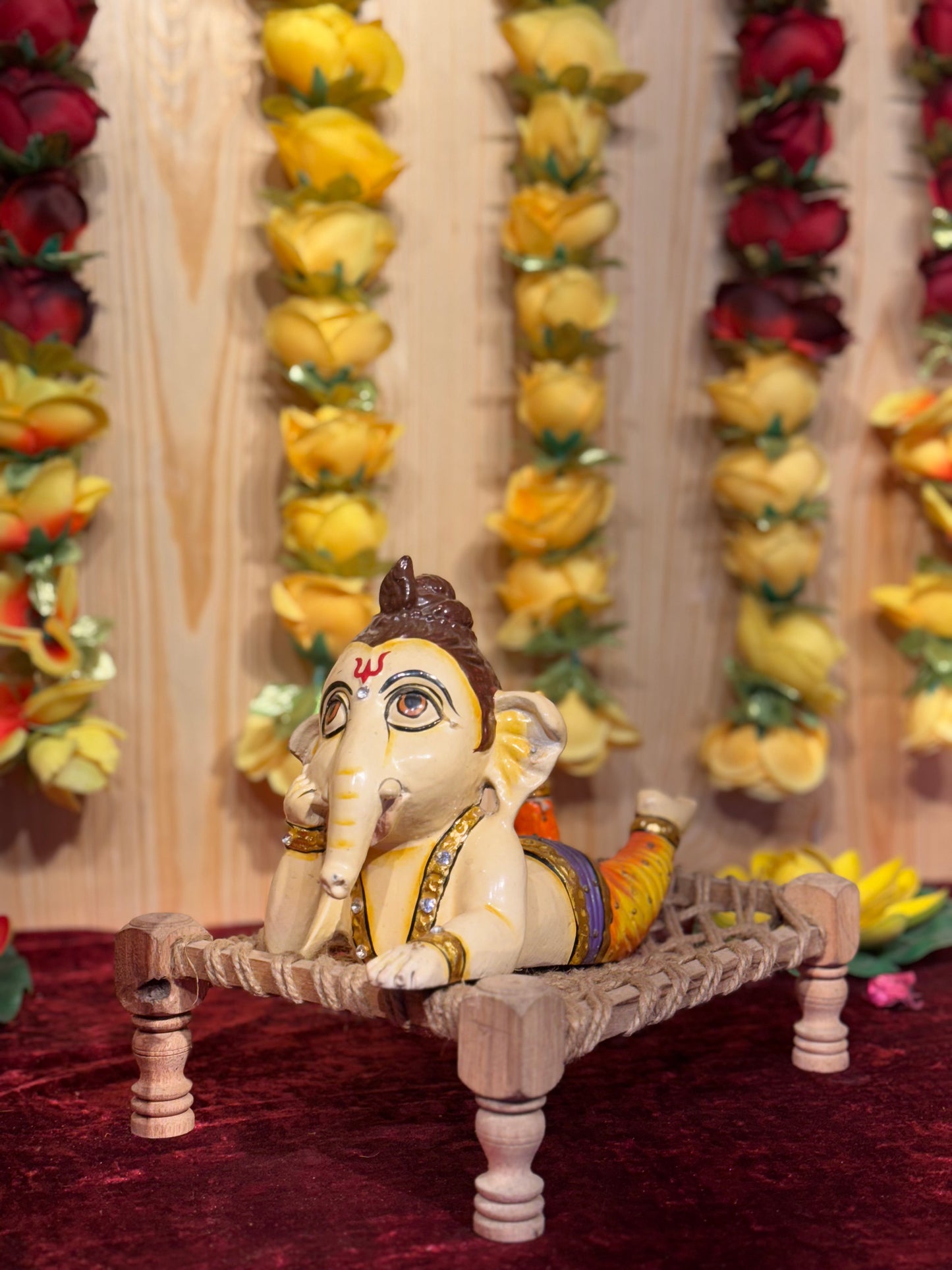 Relaxing Baby Ganesha on Cot
