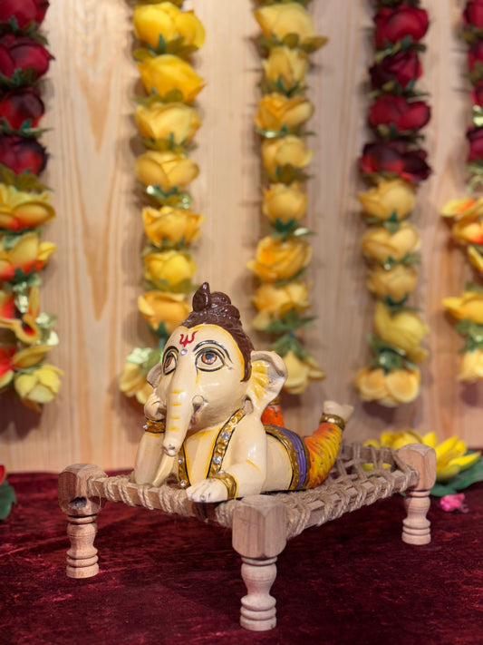 Relaxing Baby Ganesha on Cot
